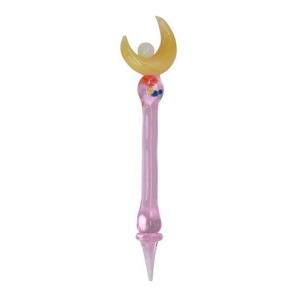 Pink heat-safe glass dab tool dabber smoking accessory with a cute crescent moon design as a handle and a pointed end