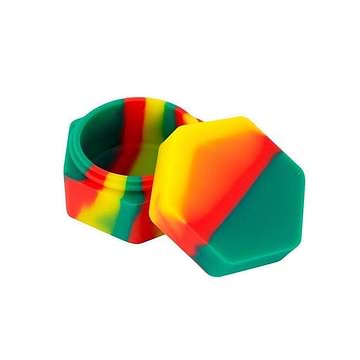 Compact petite small non-stick silicone wax container storage accessory with a funky rasta design hexagon shape