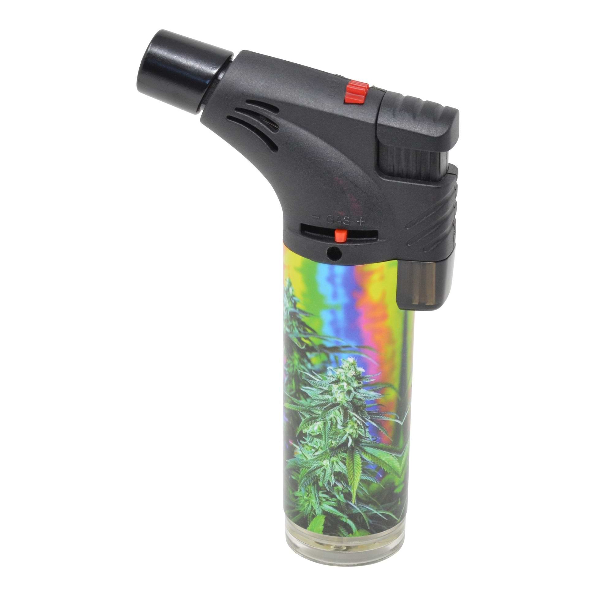 High angle shot of single flame torch black nozzle facing left with prismatic multicolored weed leaves design