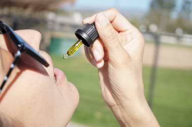 Girl microdosing CBD oil