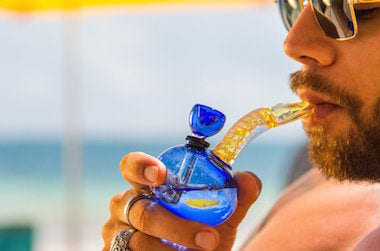 Man smoking Captain's Glass Mini Bubbler
