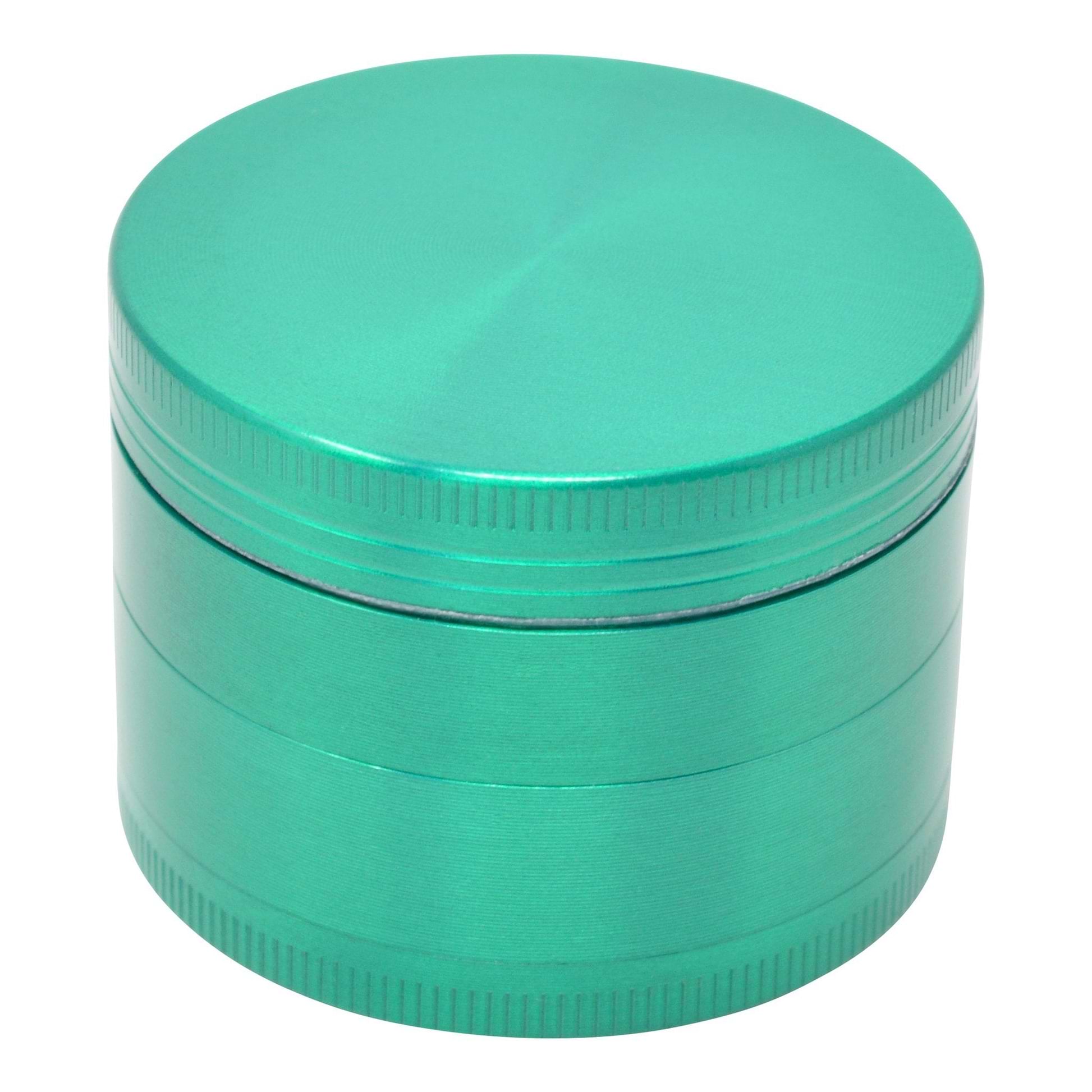 Full high angle shot of green colored 46mm metal grinder smoking accessory closed grinder container