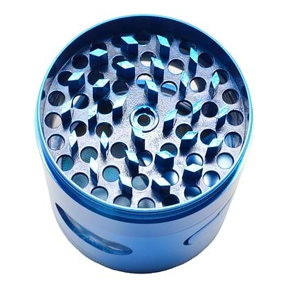 High angle shot of the scraper of shiny blue 56mm dubs grinder smoking accessory with industrial look 
