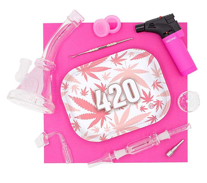 Cute set of pink dab rig, herb bowl, banger, torch, dab tool, 420 container, tray and nectar collector