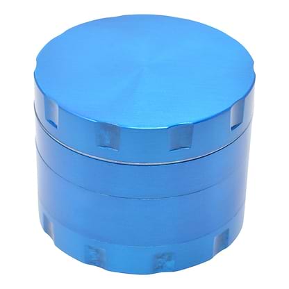 High angle shot of a closed 48mm blue grinder smoking accessory lid with smooth surface ridges on the side