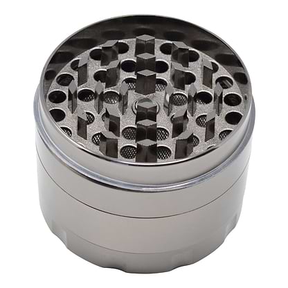 High angle shot of the scraper of an opened 48mm blue grinder smoking accessory in gray silver color