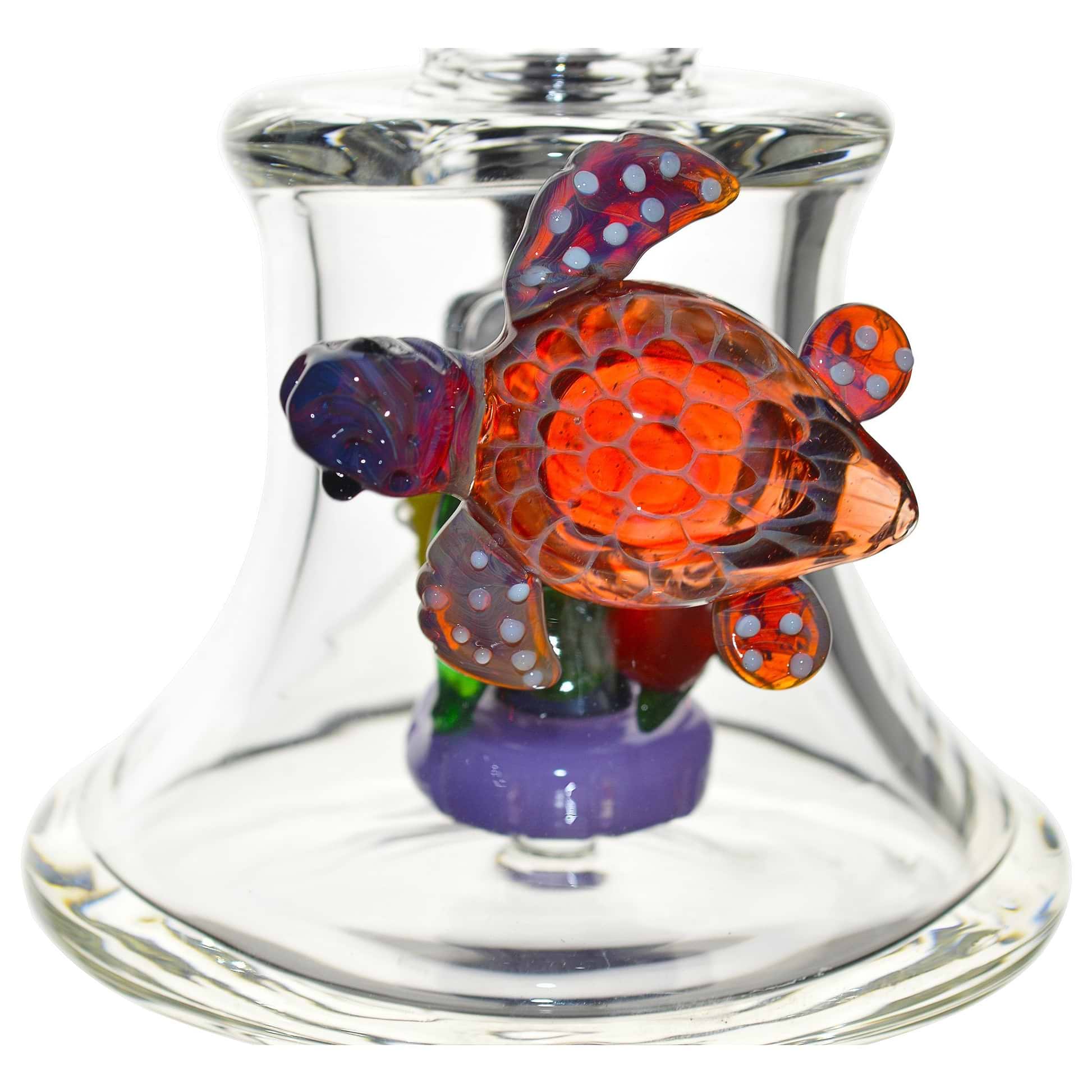 close up clear glass bong smoking device built-in ash catcher colorful turtle figure inside an aquarium look