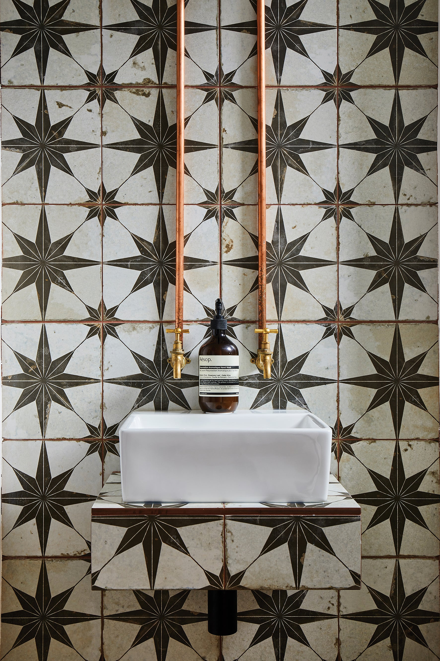 Spitalfields Ceramic Retro Star Black tiles stocked by Hyperion Tiles