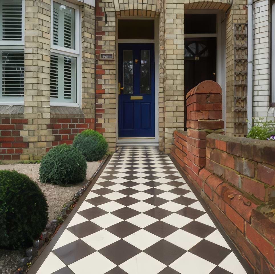 Oxford Black and White Tiles have replaced an old path - tiles stocked by Hyperion Tiles