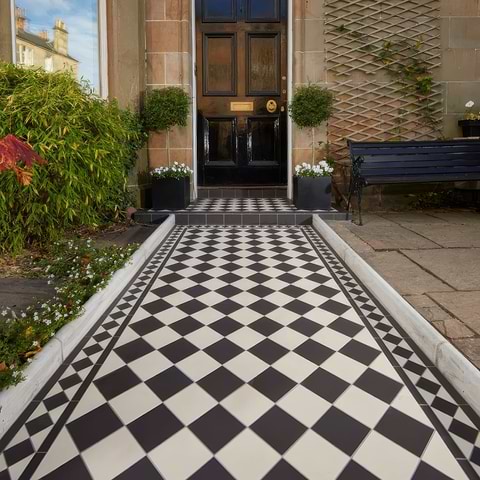 Dorchester Black and White Tiles have replaced an old path - tiles stocked by Hyperion Tiles