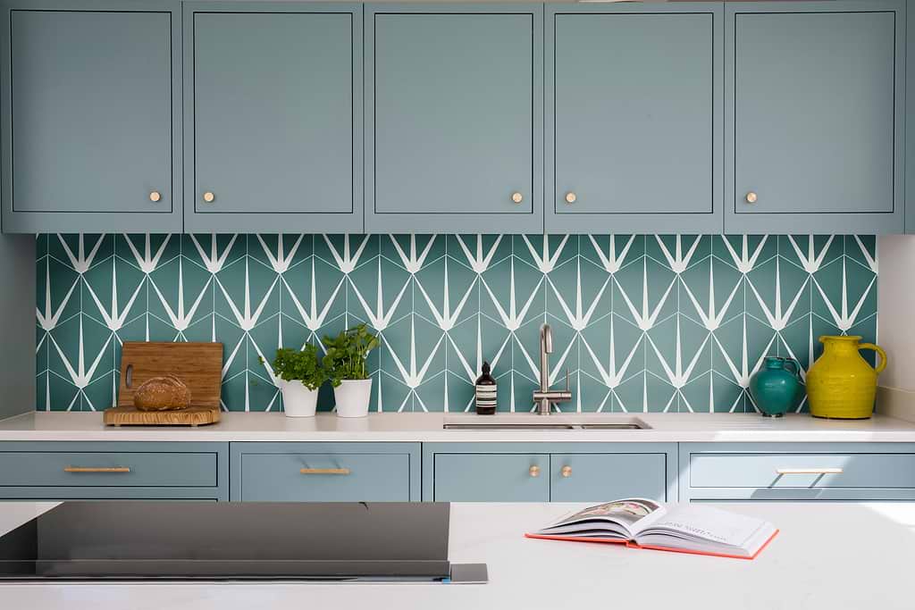 Kitchen wall in Lily Pad patterned tiles designed by Ca' Pietra and stocked at Hyperion Tiles