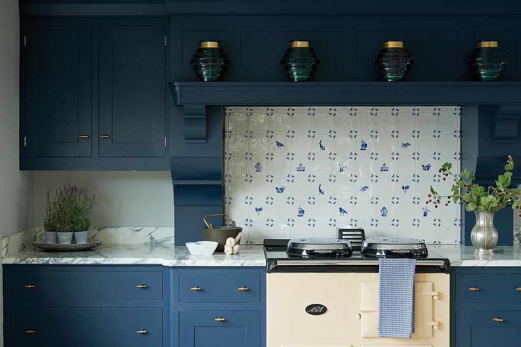 This splashback makes a focal point in the kitchen - tiles stocked by Hyperion Tiles