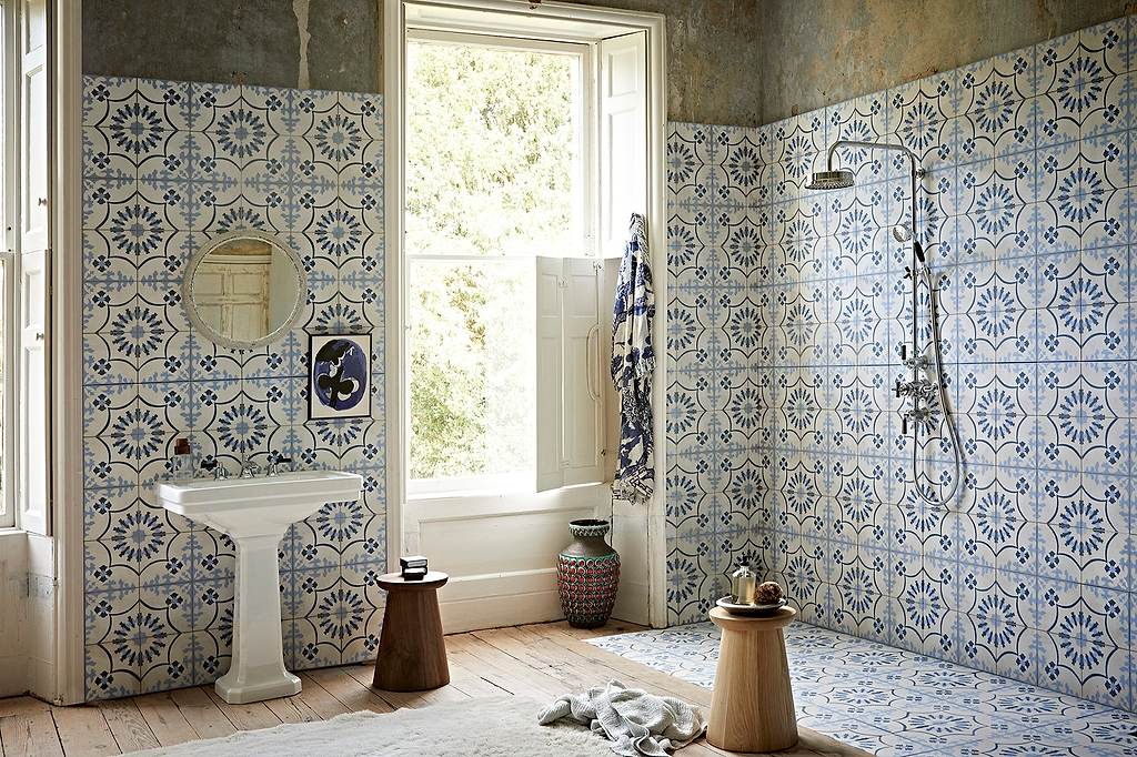 Blue tiles in a pretty pattern creating a calming bathroom