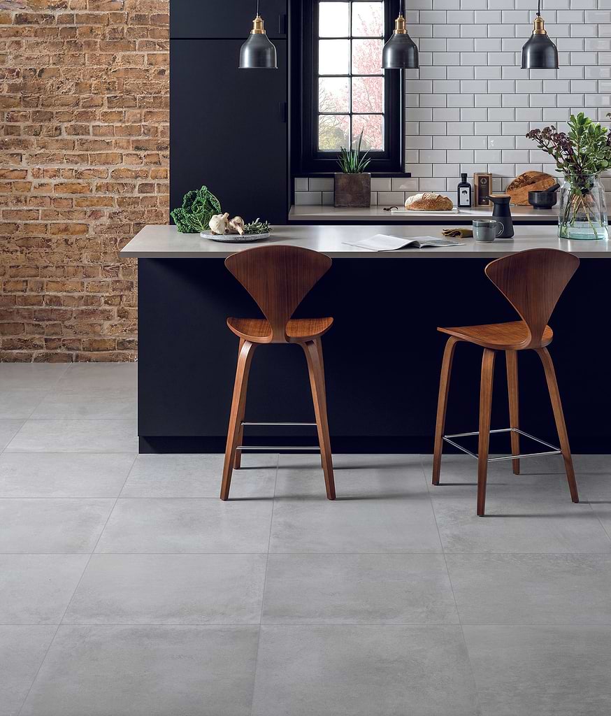 Dining area in kitchen featuring Original Style Nord Ris Matt Porcelain is a tile design for a concrete effect stocked by Hyperion Tiles