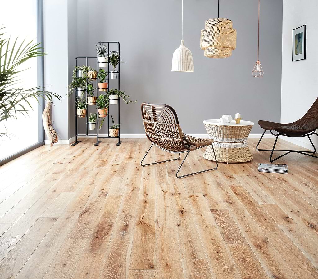 Distinctive wood grains feature in this flooring made with solid wood called York White Washed Oak by Woodpecker from Hyperion Tiles