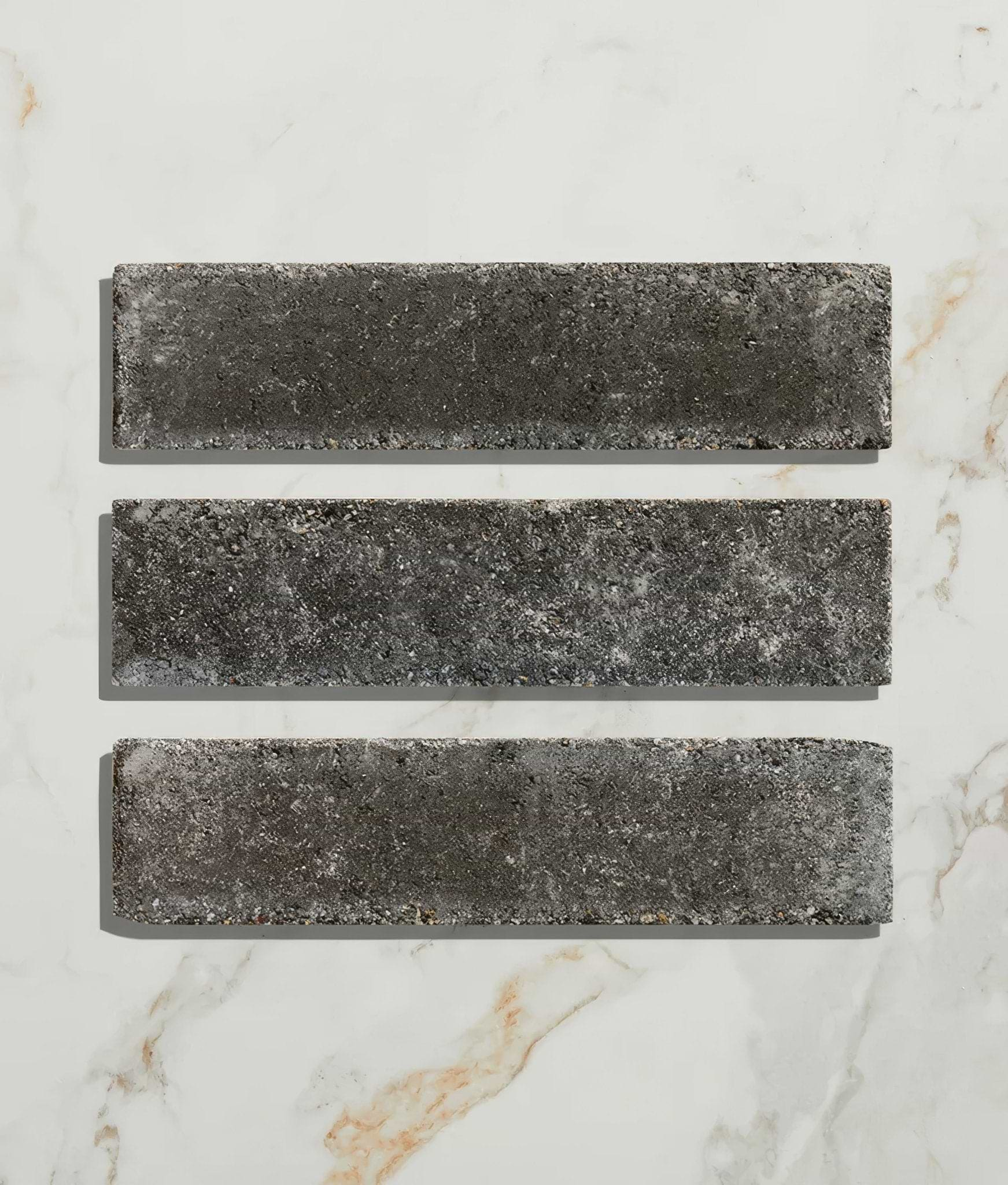 Reform Composite Stone Tumbled Nero - Hyperion Tiles