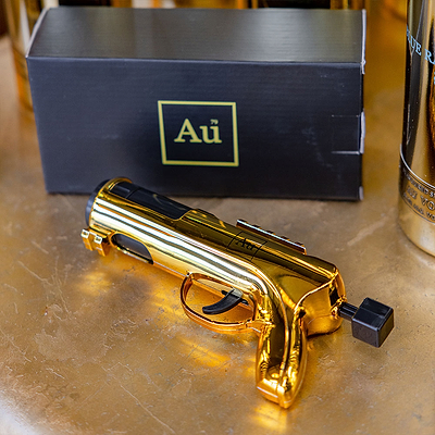 Gold Toy Gun, Au Vodka Branding, with Black Packaging Box.