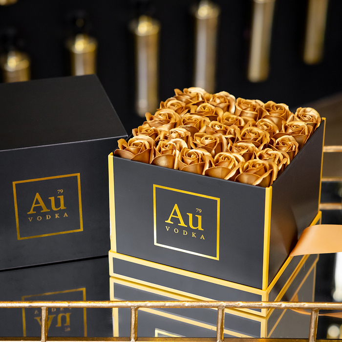 Black & Gold Gift Box, with Au Vodka Branding, filled with a Bloom of Gold Roses