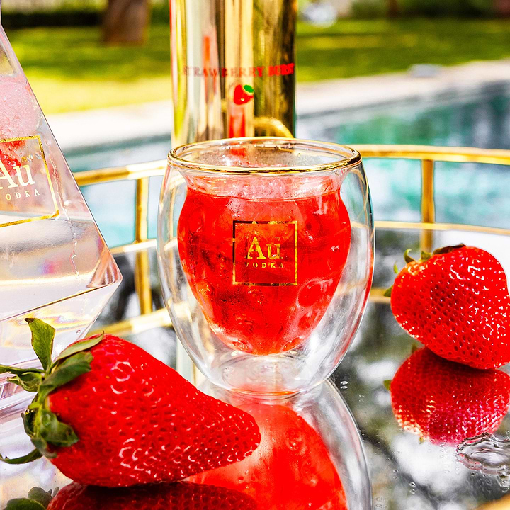 Limited Edition Strawberry glass with unique design, perfect for serving cocktails. Shop exclusive glassware on our online store.