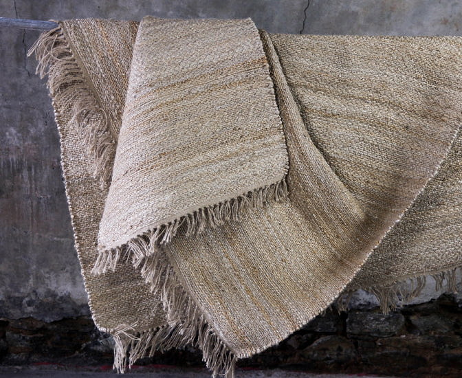 Natural jute rugs hanging