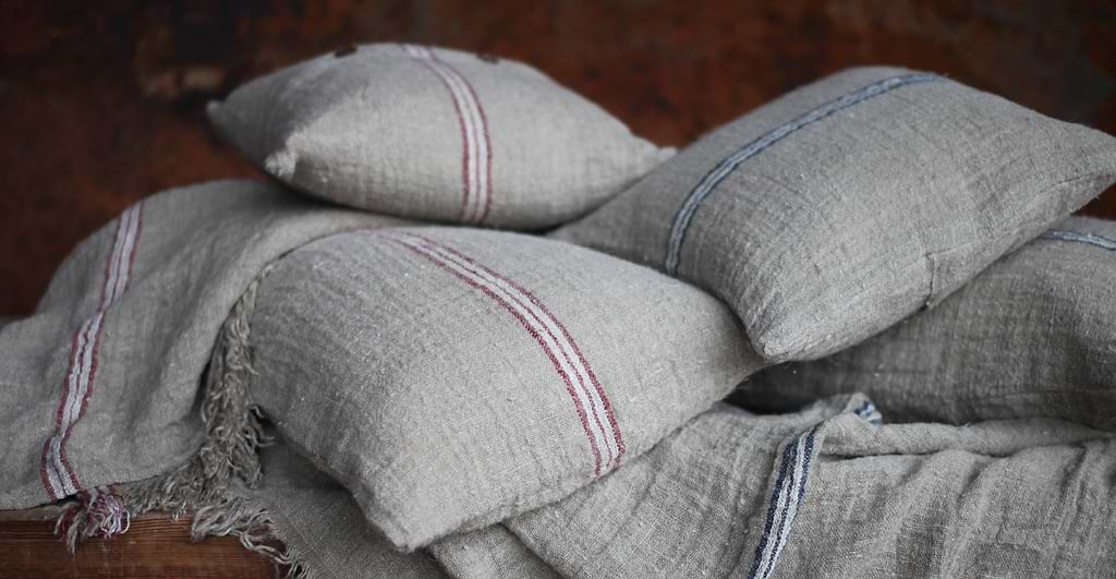 Textured natural linen throws and cushions