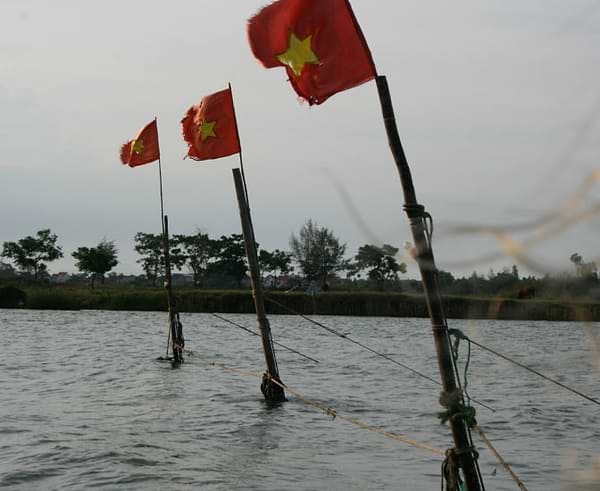 Vietnamese flags in the water