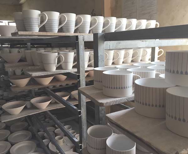 Ceramics stacked on shelves