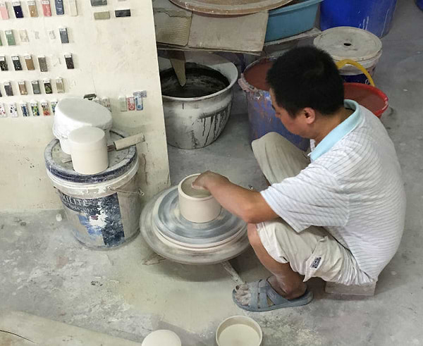 Man making ceramics