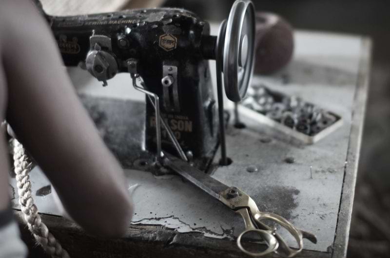 master stitcher at sewing machine