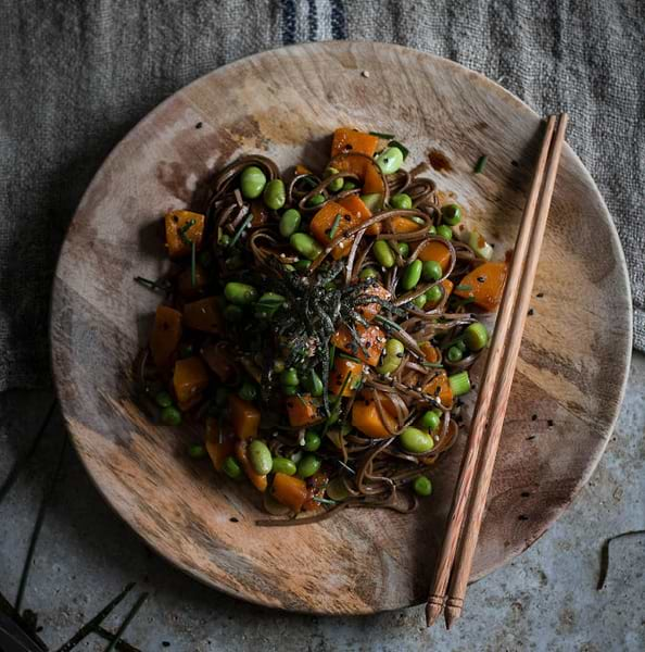 Noodles on a wooden plate