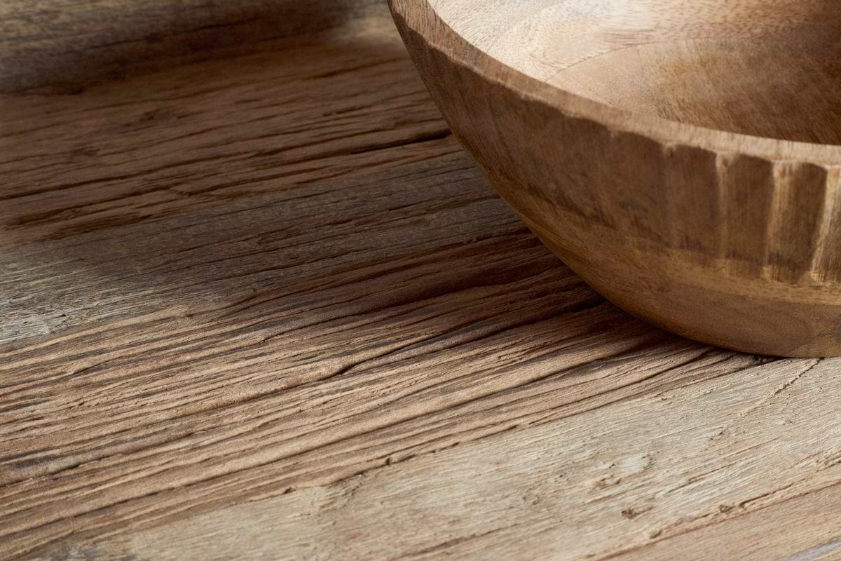 A close-up of the nkuku Ibo Reclaimed Wood Pantry Standing Shelves in Natural, with soft lighting highlighting the unique grain—ideal for styling open shelving or enhancing your kitchen console with a rustic touch.