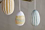 Add a charming touch to Easter decor with nkuku's Terra Hand Painted Recycled Cotton Paper Hanging Eggs—set of 3 in teal, cream, and ochre, each featuring unique hand-painted designs.