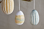 Add a charming touch to Easter decor with nkuku's Terra Hand Painted Recycled Cotton Paper Hanging Eggs—set of 3 in teal, cream, and ochre, each featuring unique hand-painted designs.
