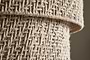 Close-up of two rolled pieces of coarse, natural beige burlap, displaying a rustic, geometric weave like the Thimba Woven Jute Chandelier by nkuku, with interlaced fibers reminiscent of its handcrafted texture under natural light.
