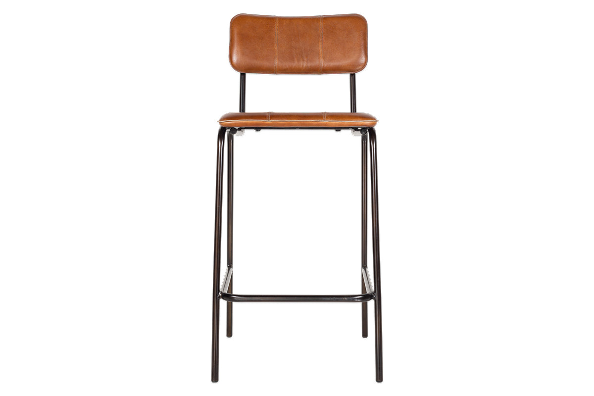 The Ukari Counter Chair - Aged Tan by nkuku features a brown leather padded seat and backrest, set on a black metal frame with four straight legs and a simple footrest. Its minimalist, modern design adds style to any space.