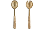 The Abani Salad Servers by nkuku feature a spoon and two-tined fork handcrafted from antique brass, each with a textured woven seagrass handle for a rustic look. Displayed on a white background.