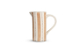 The Patthar Jug - Cream & Clay - Small by nkuku features hand-painted beige stripes and dotted lines on white ceramic, a curved handle, and a narrow spout—an eye-catching addition to your tableware collection. Displayed on a plain white background.
