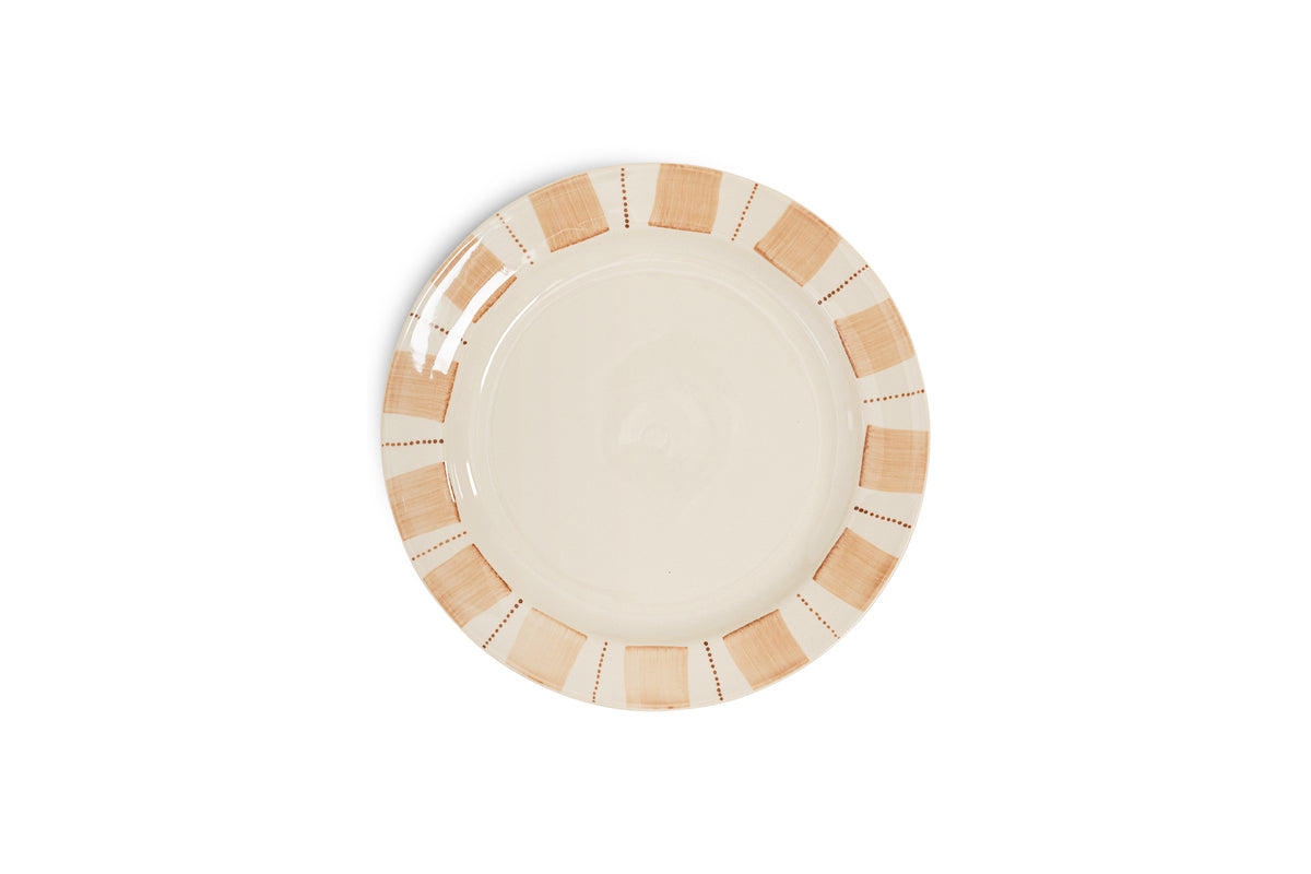 The nkuku Patthar Side Plate - Cream & Clay features a cream center and a wide rim with hand-painted light brown blocks and dotted lines in an elegant geometric pattern. Shown from above on a plain white background.
