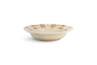 The nkuku Patthar Pasta Bowl - Cream & Clay features a shallow, round ceramic design with a wide rim accented by alternating tan and beige stripes and dotted lines, adding rustic charm to your dinnerware. Shown on a plain white background.