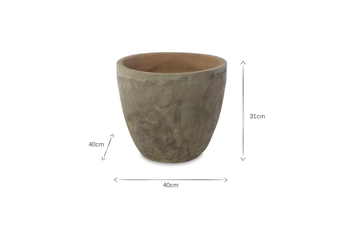 The nkuku Affiti Clay Planter - Medium is a round, grey concrete planter with a tapered base and textured surface, ideal for rustic garden decor. It measures 31 cm high and 40 cm in diameter, shown empty against a plain white background.