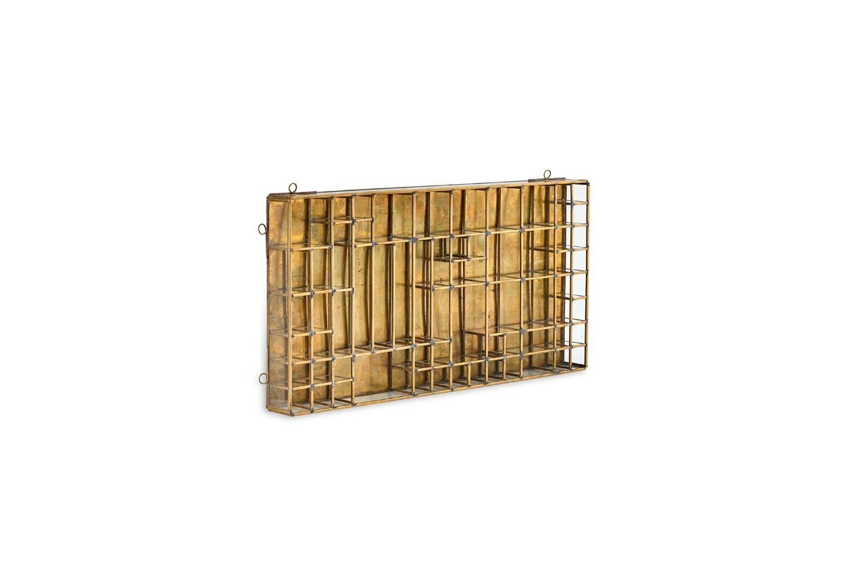 The Oni Printers Drawer - Brass by nkuku is a rectangular, wall-mounted metal rack with a gold finish and grid structure, inspired by traditional printing drawers. It features multiple sections for organized storage or display.