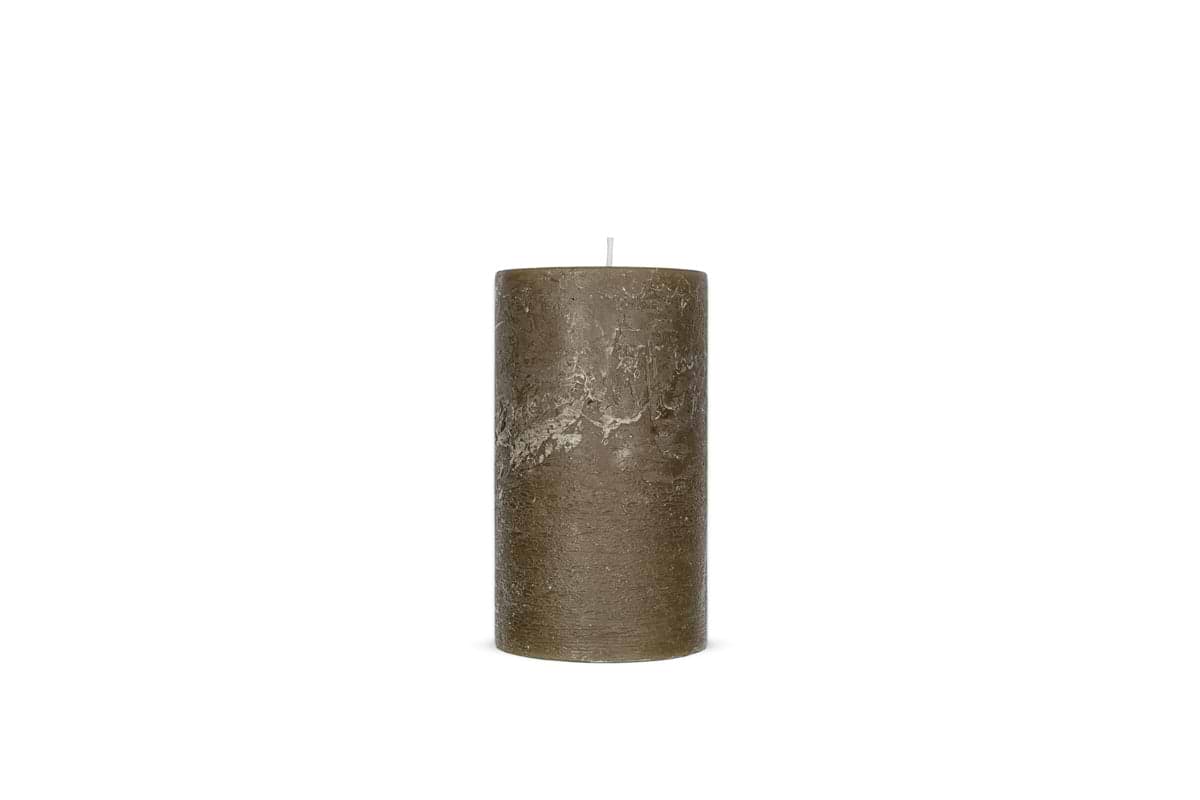 The Nkuku Rustic Soy Blend Pillar Candle in olive green, small size, stands unlit with a white wick and a textured, natural finish against a plain white background.