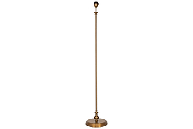 The nkuku Ehadi Antique Floor Lamp features an antique brass pole and a sleek black shade, offering modern elegance to any room.