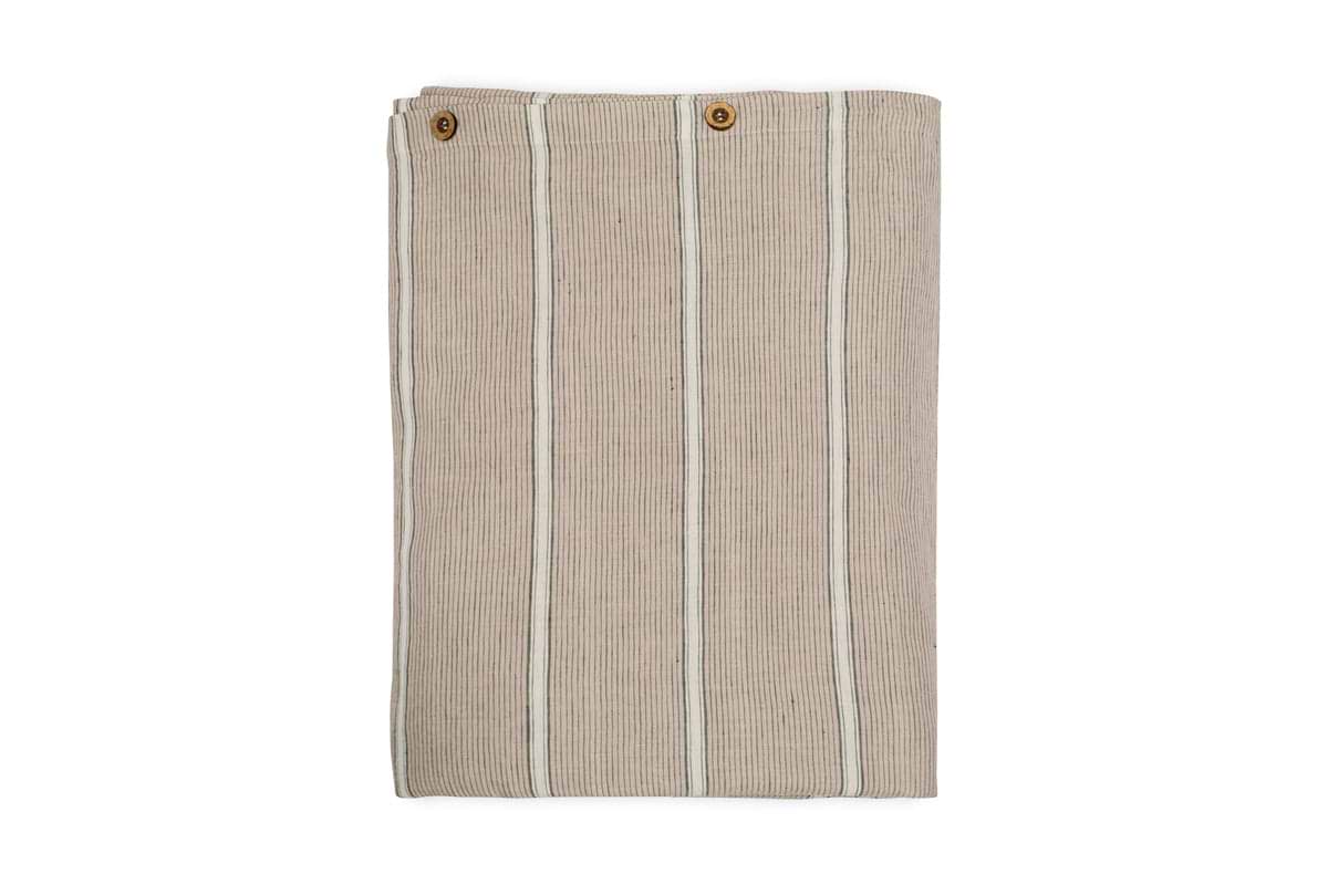 The nkuku Mora Hemp & Cotton Duvet Cover in stone grey is shown folded with vertical white stripes and two brown buttons near the top edge, displayed on a white background.