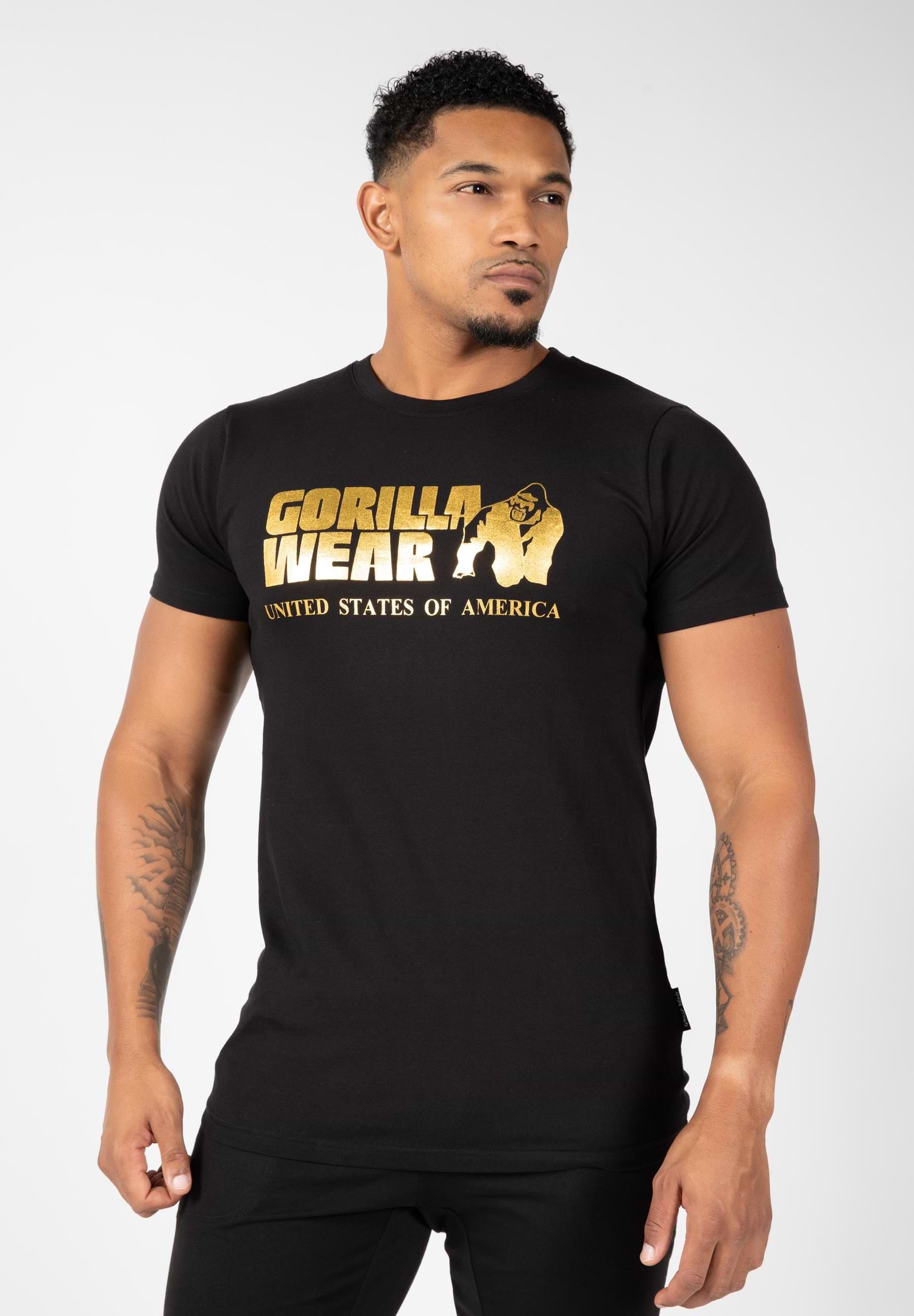 https://sfycdn.speedsize.com/c25f6533-6b88-466f-b868-046faea8c084/https://usa.gorillawear.com/cdn/shop/products/90553922-classic-t-shirt-black-gold-6.jpg?v=1622709332