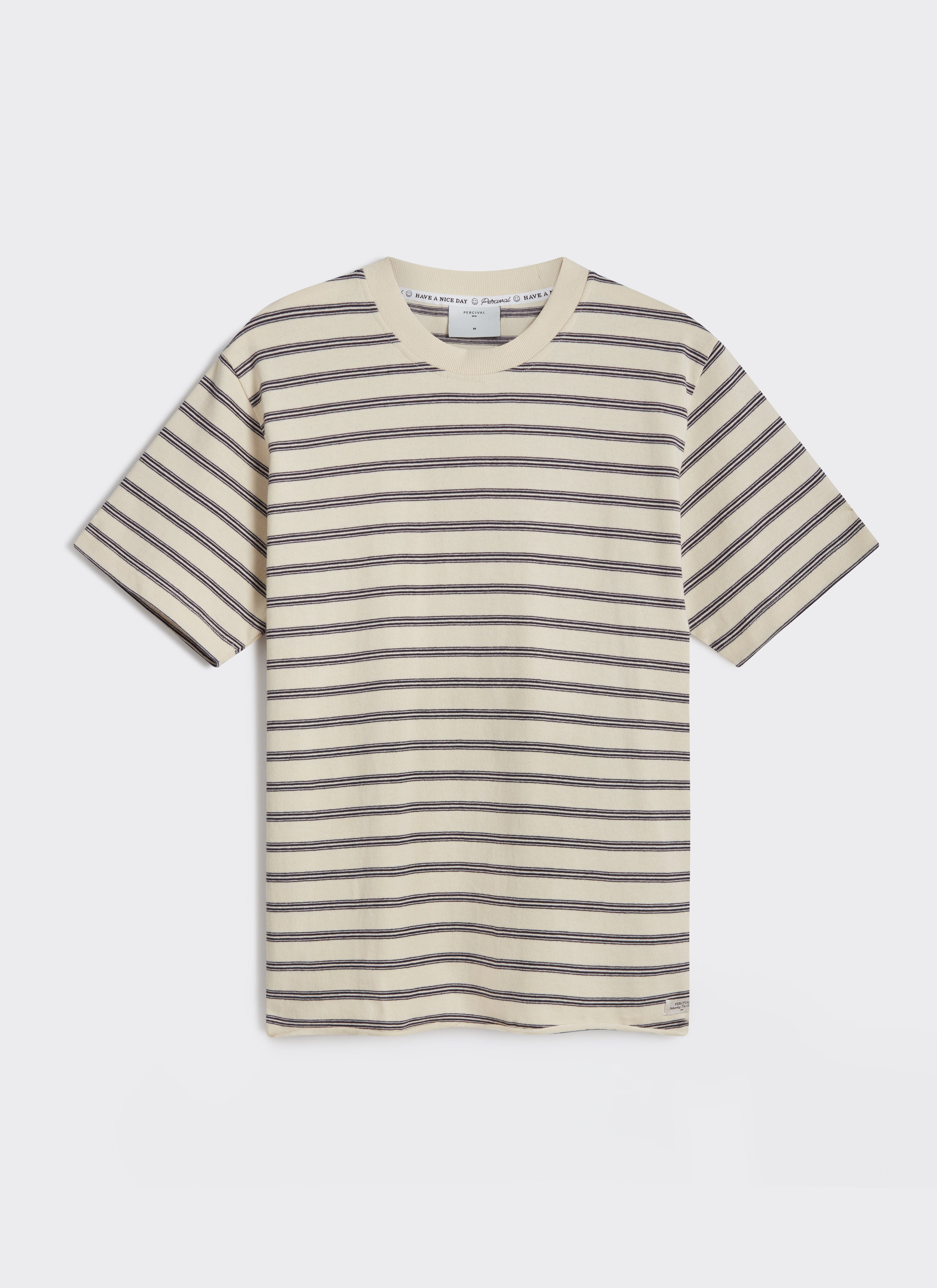 A flat lay of the Percival Arlo Raw Hem Breton T-Shirt in cream with black stripes, crafted from organic cotton.