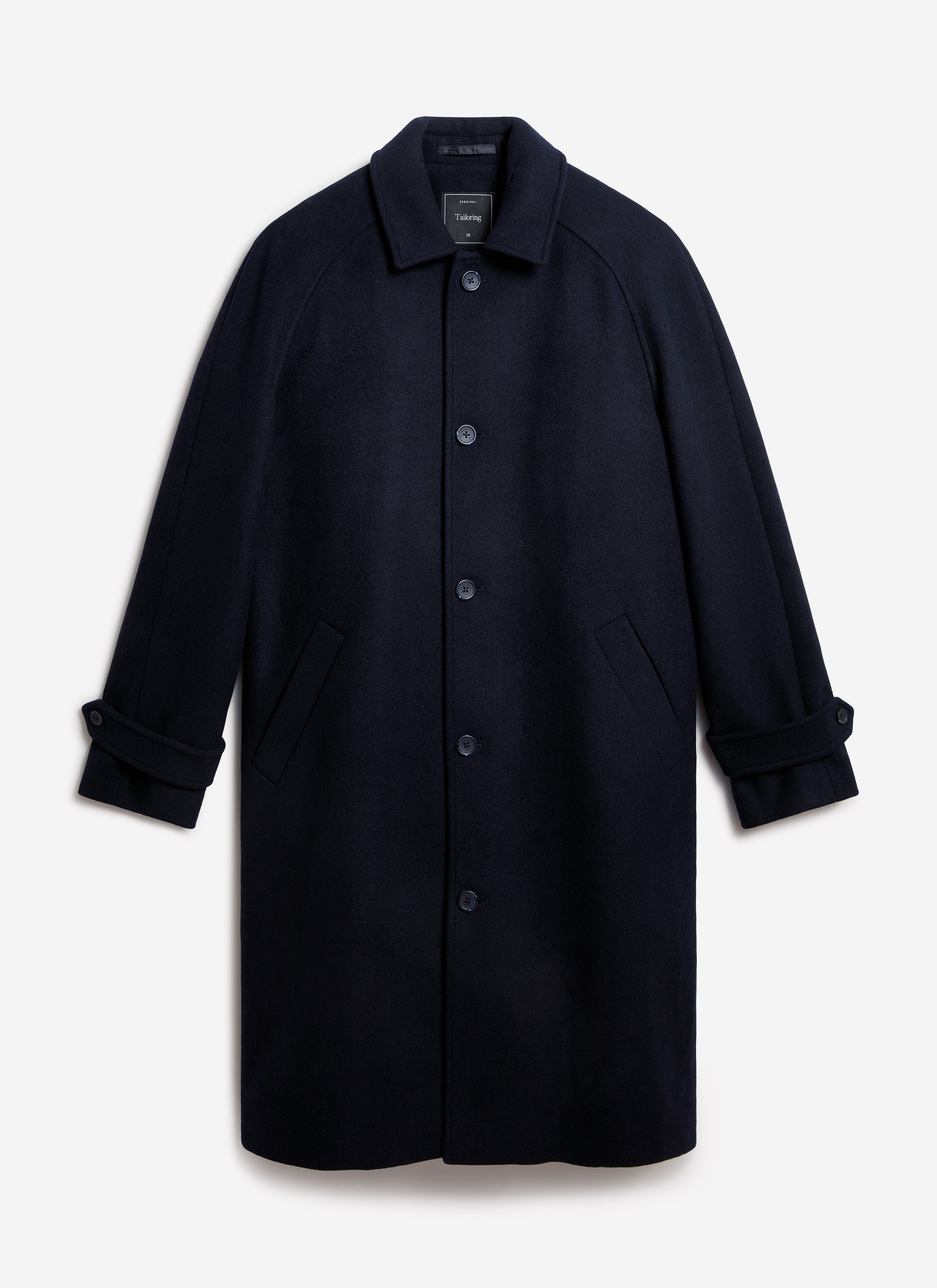 The Percival Wool Car Coat in navy, shot flat against a white background to showcase its classic silhouette.