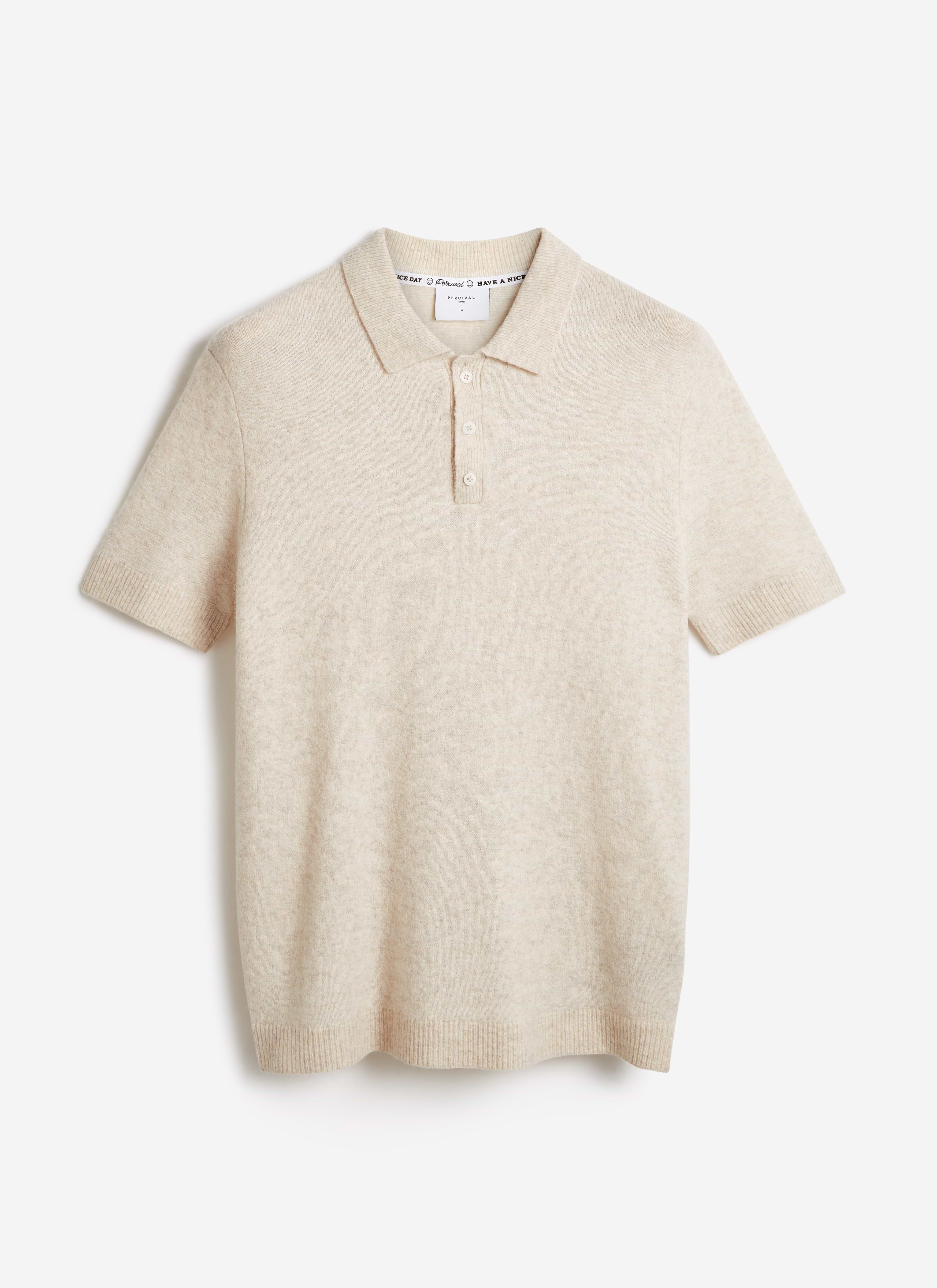 Percival Collins Boxy Knitted Polo in ecru cream yak-wool blend, featuring short sleeves and a three-button placket.