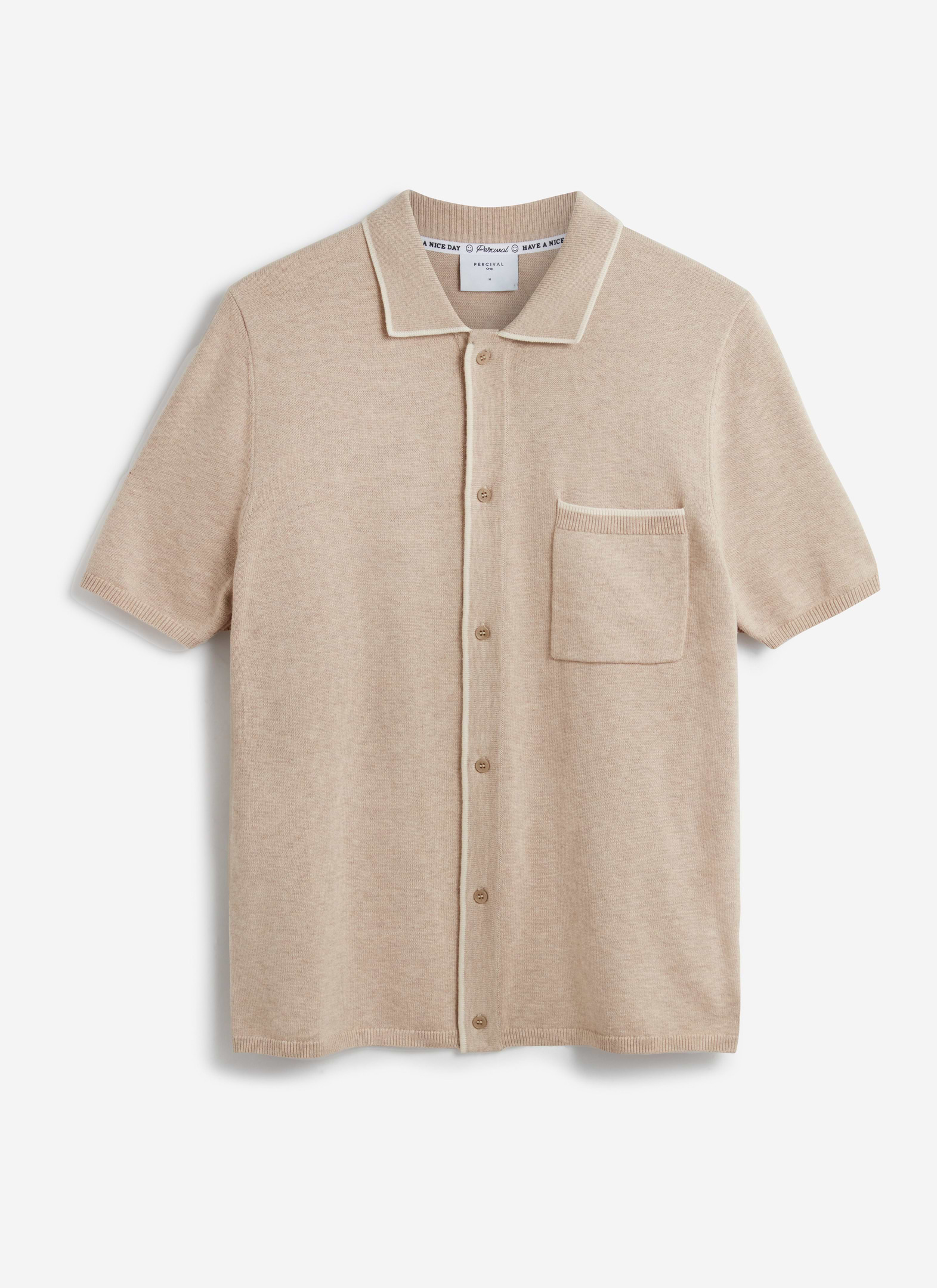 A flat lay of the Percival Contrast Trim Regular Knitted Shirt in beige, showing the white trim detail and chest pocket.