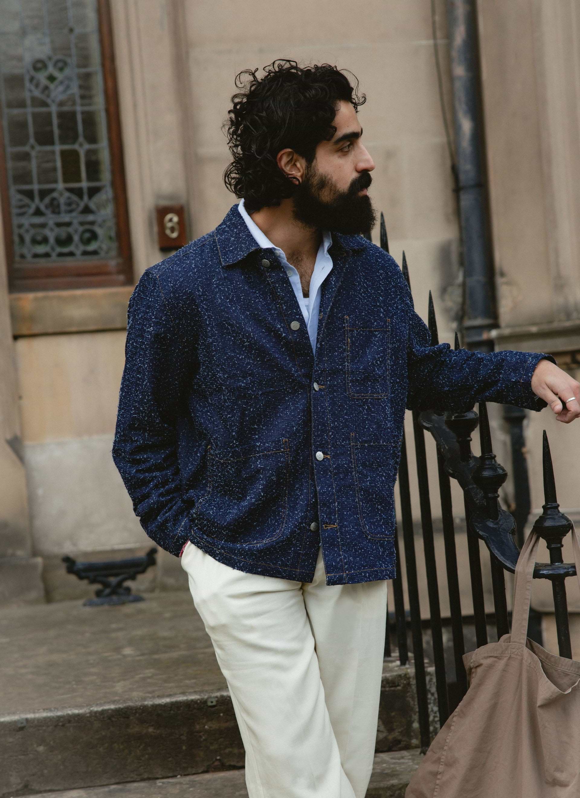 Navy Percival Parsons Chore Jacket in a textured cotton nep finish with contrast stitching, worn by a model outdoors.